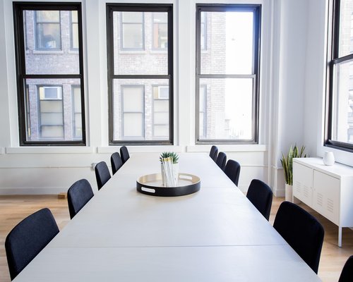 A bright and quiet shared workspace interior located in Madrid center
