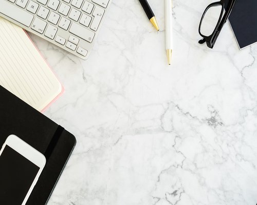 A modern and bright desk space demonstrating a structured home office setup